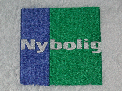 Håndklæder-med-Nybolig_broderi-uniquemade