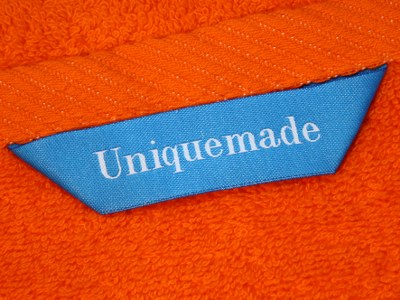 Håndklæder med logo i stroppen